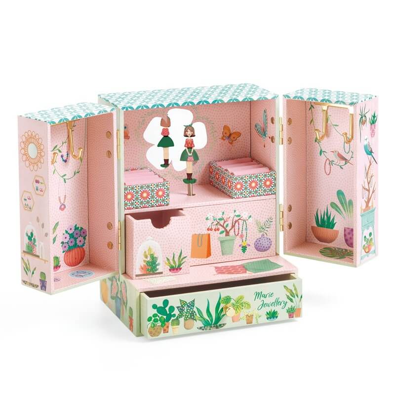 caja musica dentro jardin